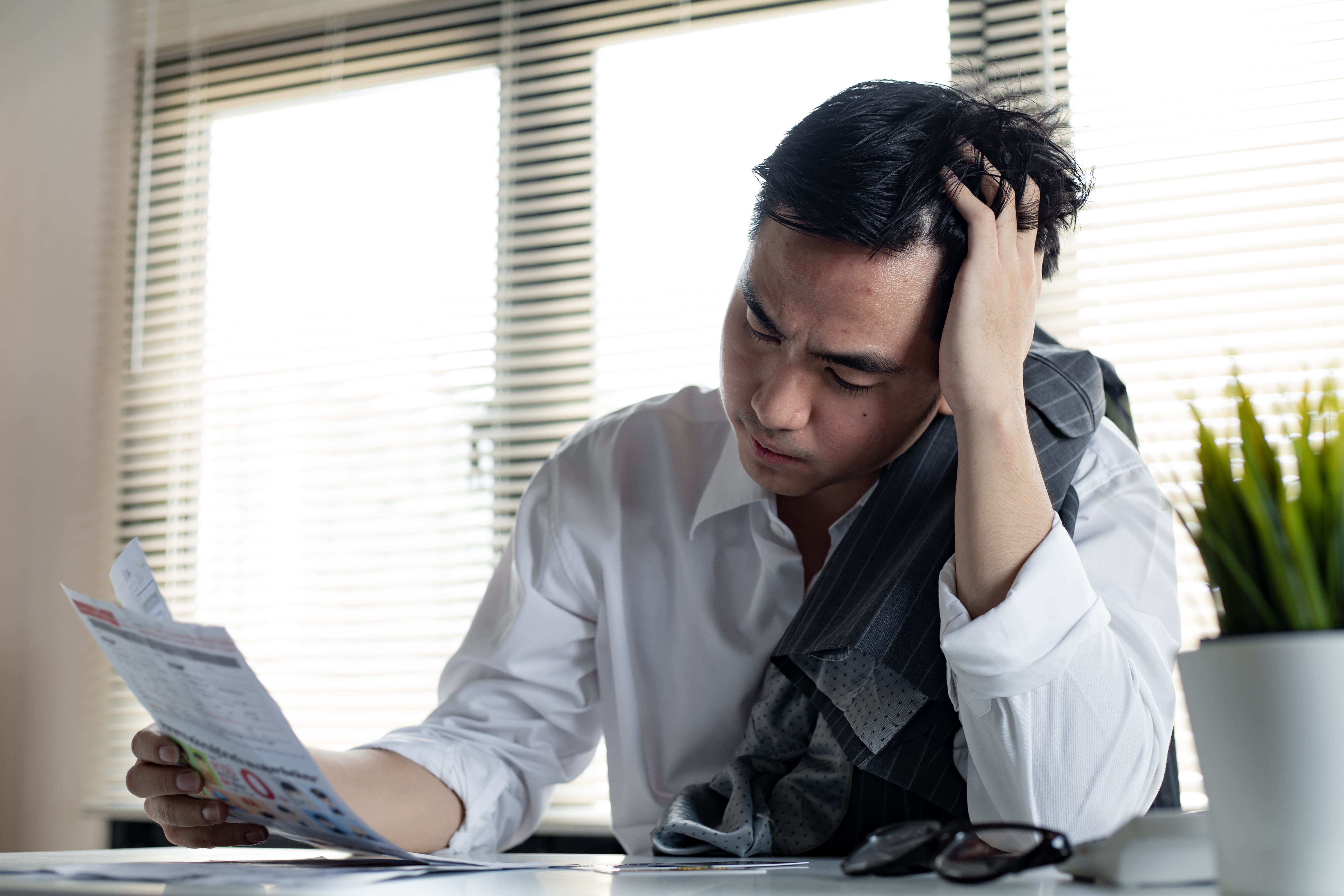 asian-man-is-stressed-and-overthink-by-debt-from-m-2021-09-02-14-56-27-utc.jpg